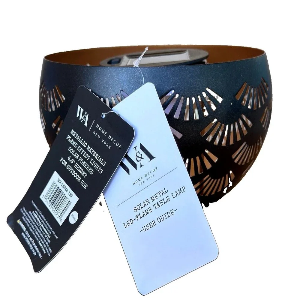 A Home Decor Solar Metal LED Flame Table Lamp Cutout Outdoor Lantern⁠